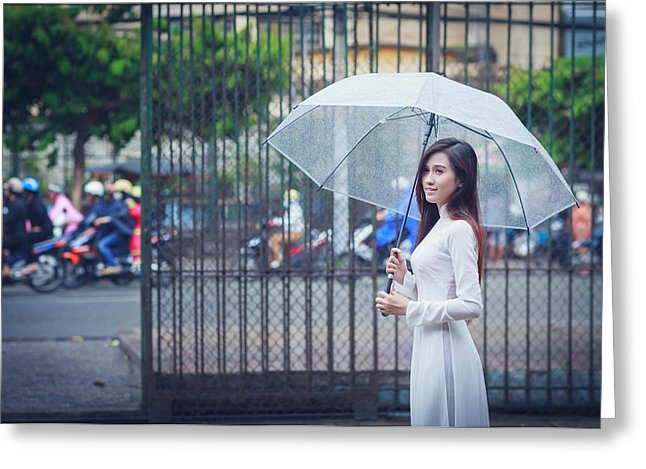 A umbrella in the rain huynh thu